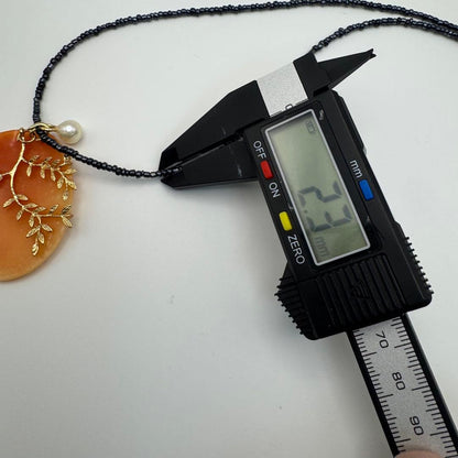 Large shell cameo pendant necklace with black spinel beads and 8mm Akoya pearls on silver 925 clasp chain
