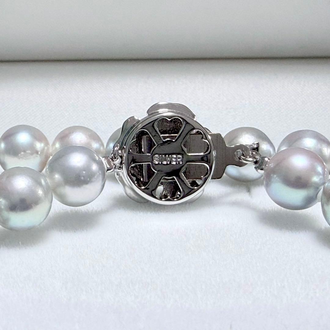 Honma Pearl Akoya natural 7.6-8.0mm light gray pearl necklace with silver clasp on white background
