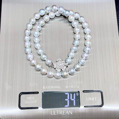 Honma Pearl Akoya natural 7.6-8.0mm light gray pearl necklace with silver clasp on white background
