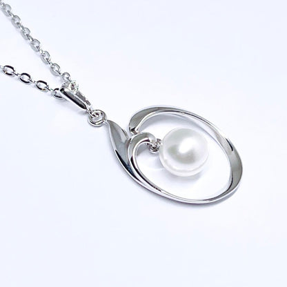 MIKIMOTO pearl necklace with 6.4mm pearls on silver chain, 40cm length