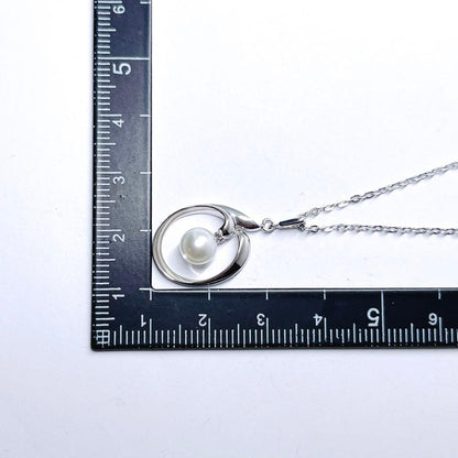 MIKIMOTO pearl necklace with 6.4mm pearls on silver chain, 40cm length