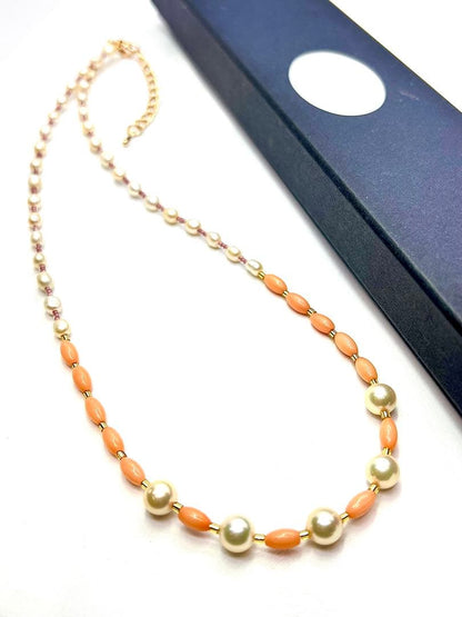 Akoya pearl and pink coral genuine pearl gold necklace with adjustable length and varying bead sizes