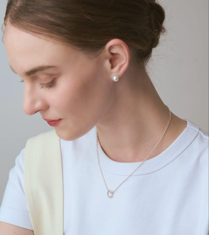 agete silver diamond necklace with a single sparkling diamond on delicate chain