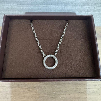 agete silver diamond necklace with a single sparkling diamond on delicate chain