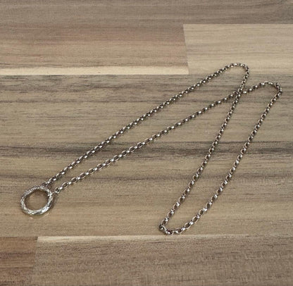 agete silver diamond necklace with a single sparkling diamond on delicate chain