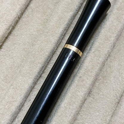 Vintage Pilot rotating lead mechanical pencil with visible wear and scratches