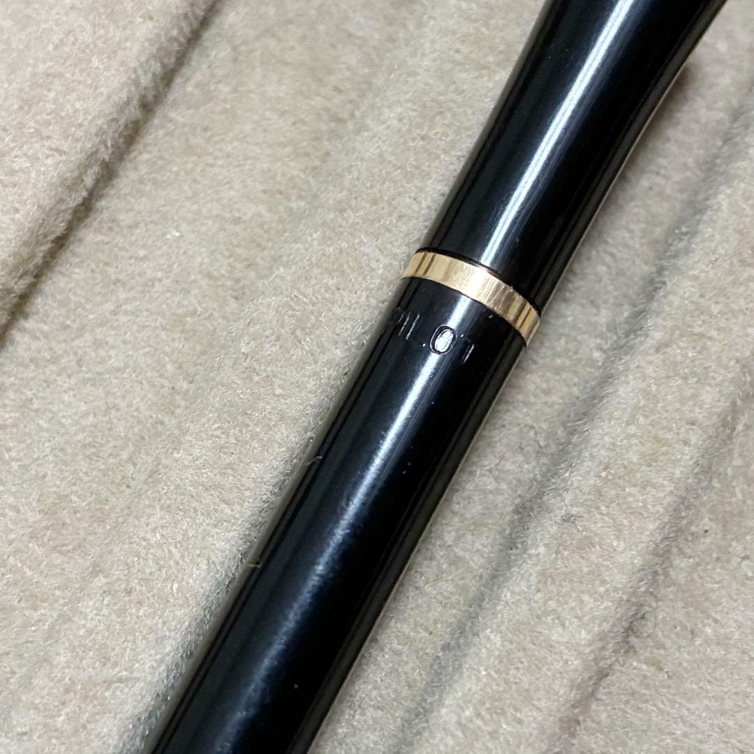Vintage Pilot rotating lead mechanical pencil with visible wear and scratches