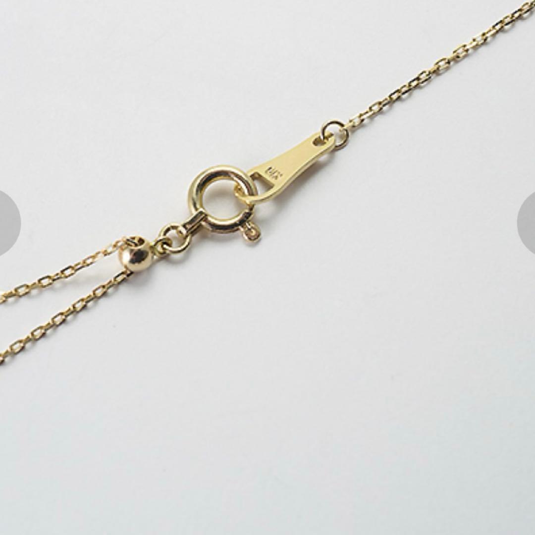 agete K10 pearl necklace featuring 3 round and elongated baroque pearls with adjustable sliding chain