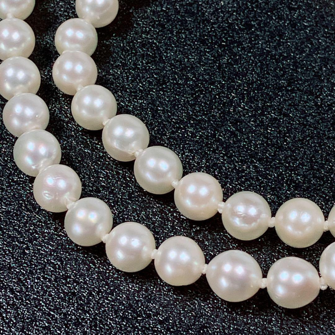 Akoya pearl necklace with 5.8 to 6.3mm pearls and silver clasp on a white background