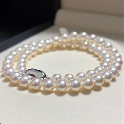 Akoya pearl necklace displayed with Hanadama pearl box and Aurora design, 46 cm length, white pearls