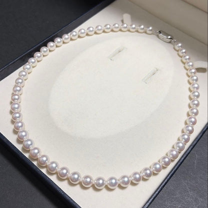 Akoya pearl necklace displayed with Hanadama pearl box and Aurora design, 46 cm length, white pearls