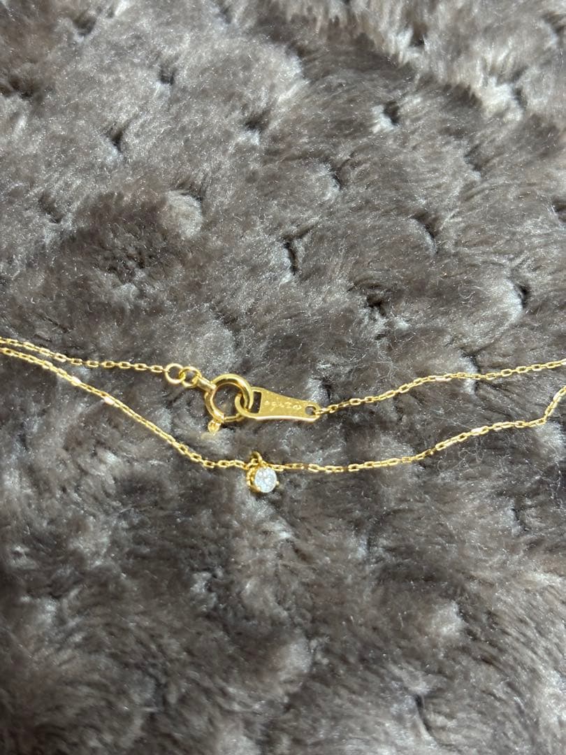 Kuro Law Diamond Necklace in 18K yellow gold with 0.05ct diamonds and 40 cm chain on white background