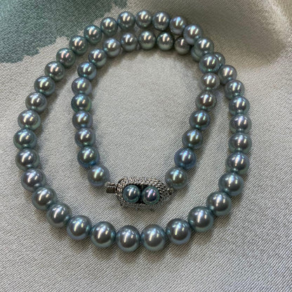 Tasaki Akoya gray pearl necklace and matching blue silver earrings set with rainbow luster