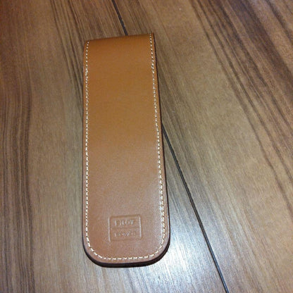 Brown leather pen case by Pilot Somes designed to hold two pens in a simple style