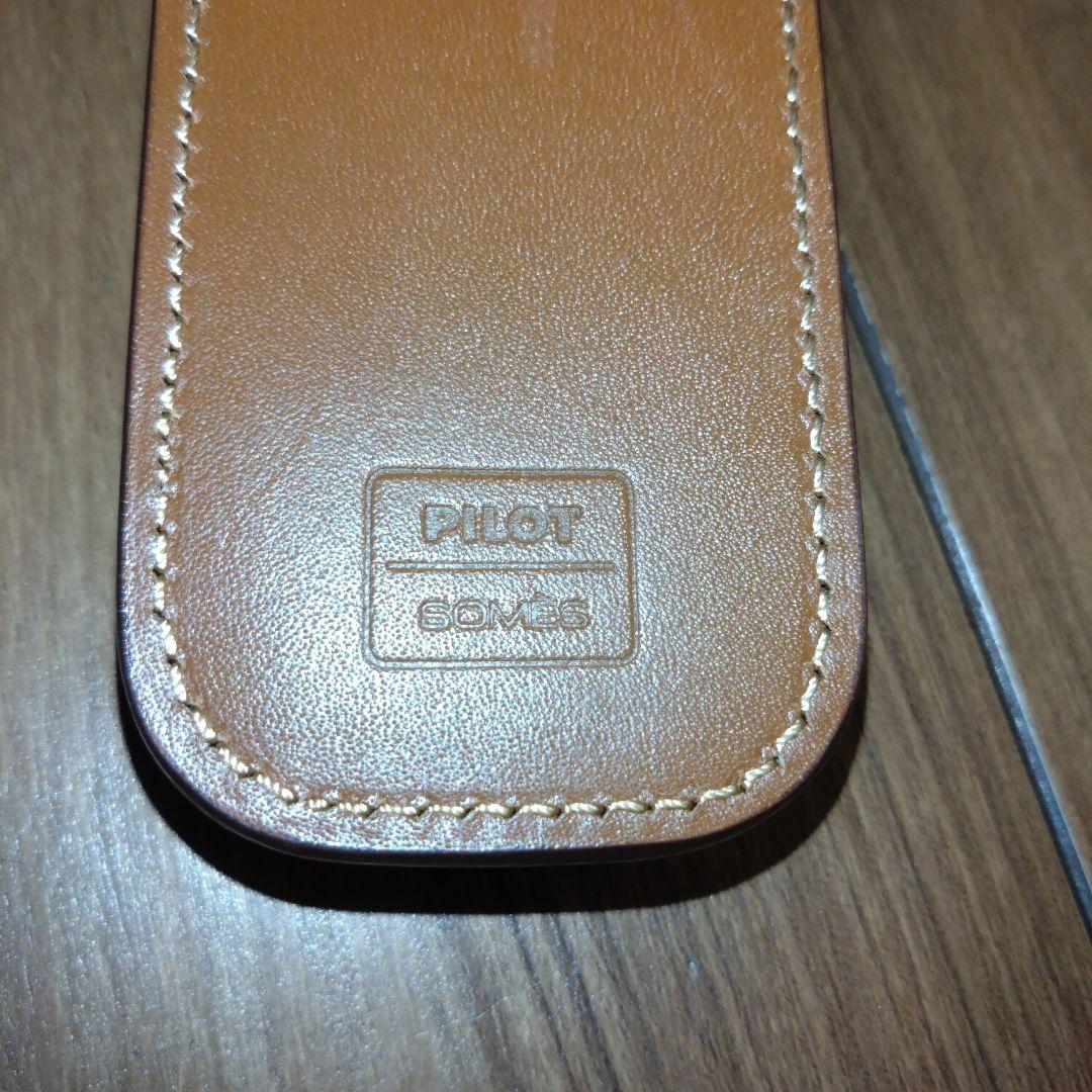 Brown leather pen case by Pilot Somes designed to hold two pens in a simple style