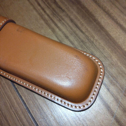 Brown leather pen case by Pilot Somes designed to hold two pens in a simple style