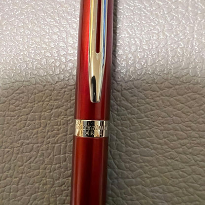 Red Waterman ballpoint pen stored in a pen case with sleek design
