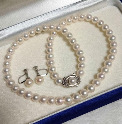 Kuro Nipple Piercing set with 44 cm necklace and 7.1 mm earrings displayed on white background