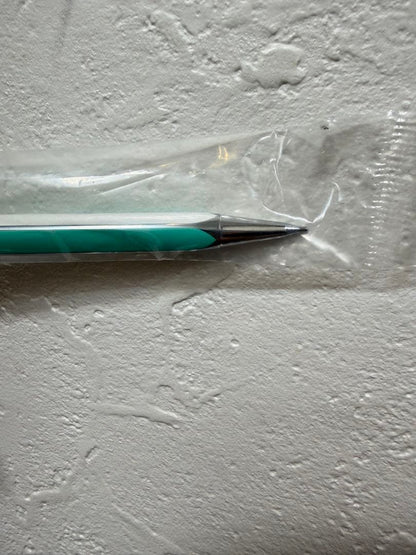 Pilot Quatro Quattro mechanical pencil in mint green metal, unused, 6.7 inches long, shown in new condition