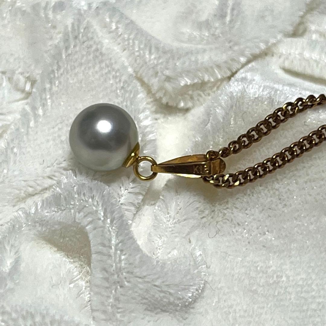K18 gold Akoya pearl necklace top featuring a 7.1mm pearl weighing 0.6g
