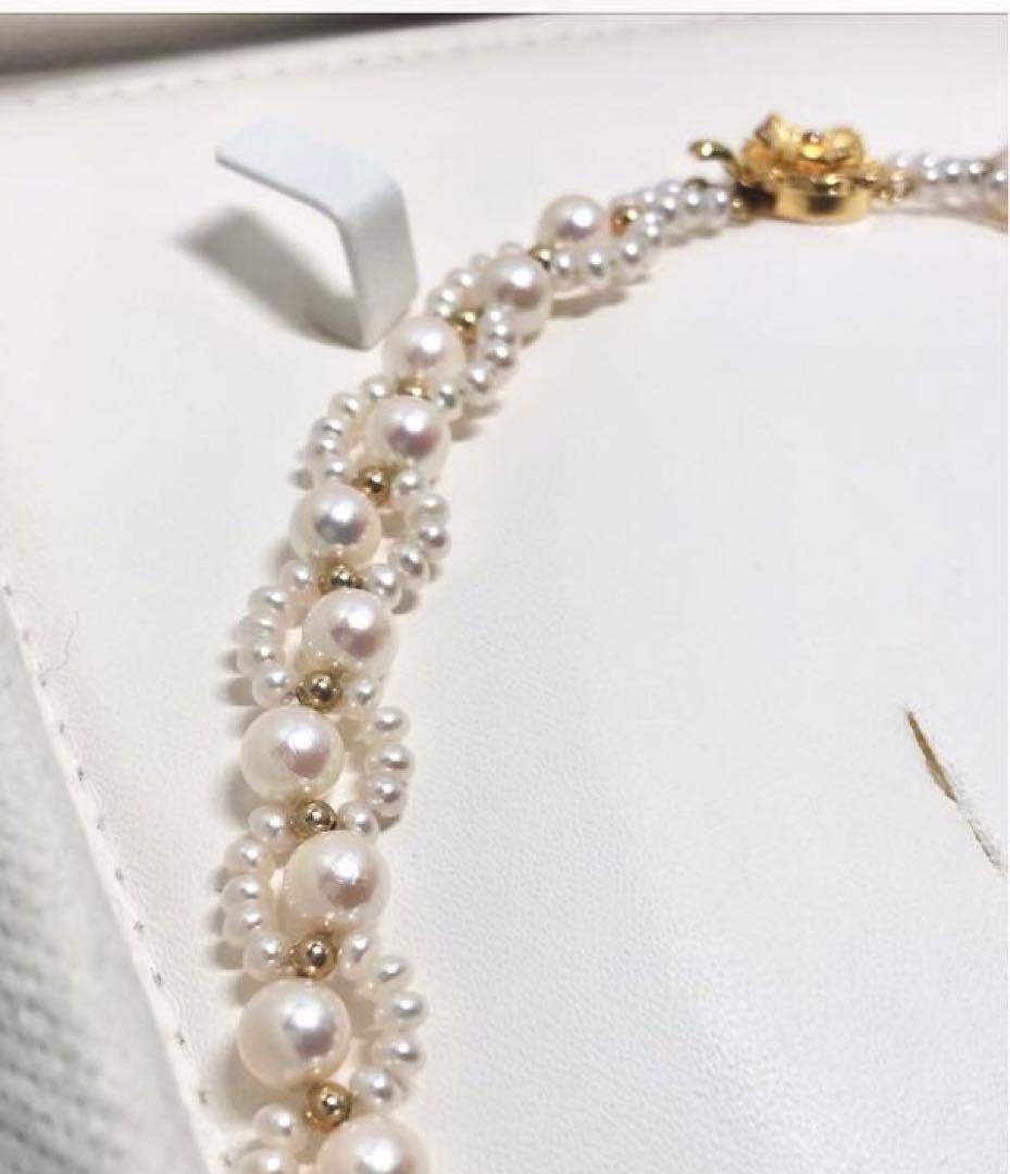 Akoya and freshwater pearl braided necklace with white pearls and silver clasp, approximately 43cm long