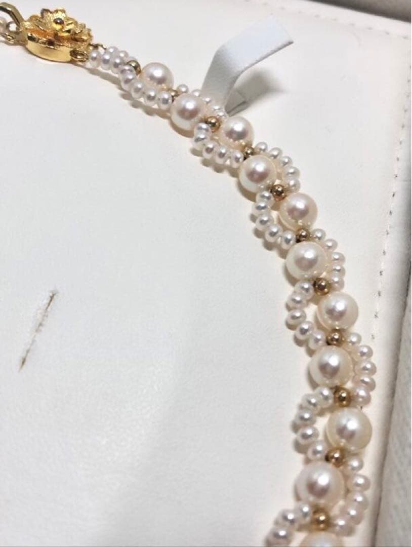 Akoya and freshwater pearl braided necklace with white pearls and silver clasp, approximately 43cm long