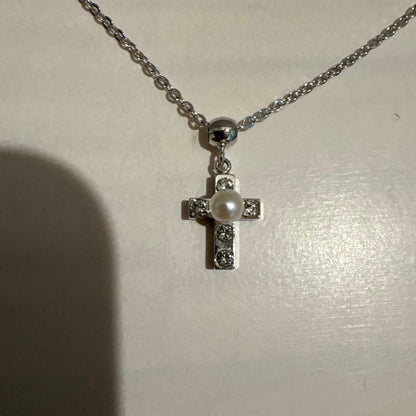 Mikimoto Pearl Island 2-strand silver necklace featuring a cross pendant decorated with pearls and rhinestones