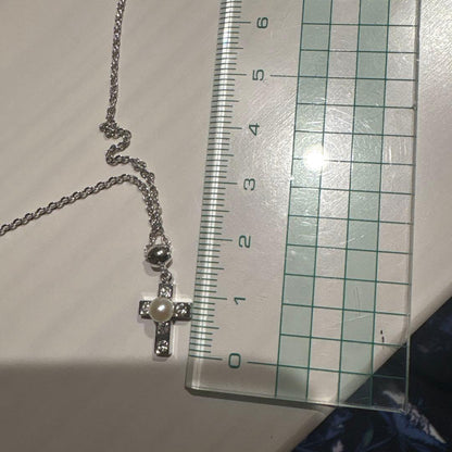 Mikimoto Pearl Island 2-strand silver necklace featuring a cross pendant decorated with pearls and rhinestones