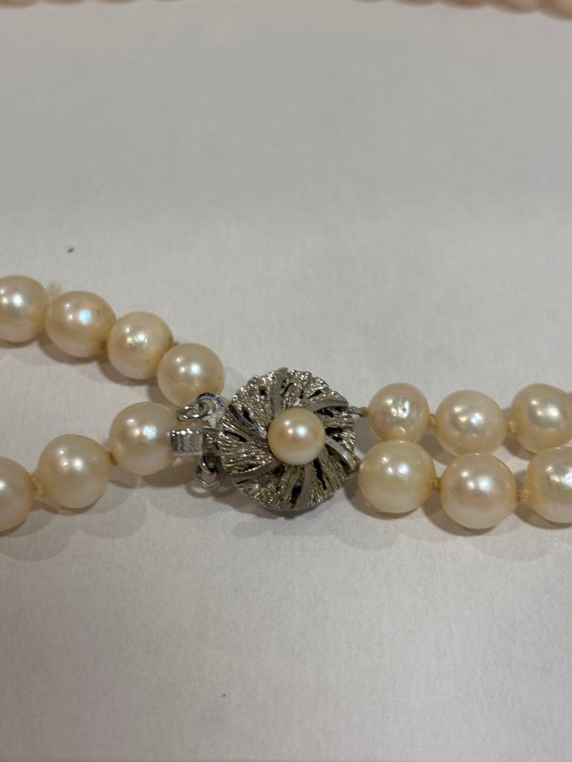 Honest Pearl 2-strand Akoya pearl necklace with silver stamped clasp on white background