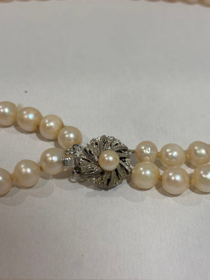 Honest Pearl 2-strand Akoya pearl necklace with silver stamped clasp on white background
