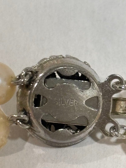 Honest Pearl 2-strand Akoya pearl necklace with silver stamped clasp on white background