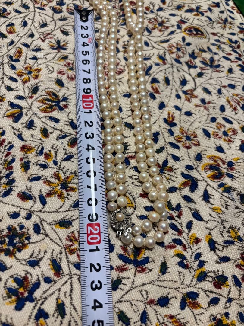 Honest Pearl 2-strand Akoya pearl necklace with silver stamped clasp on white background