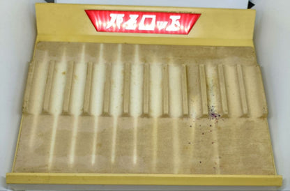 White and red Pilot pen tray with sunburned and heavily stained surface