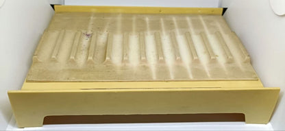 White and red Pilot pen tray with sunburned and heavily stained surface