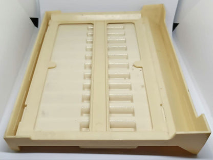 White and red Pilot pen tray with sunburned and heavily stained surface