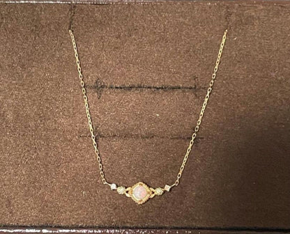 Agete Opal Necklace featuring 10 karat gold chain and diamond decoration