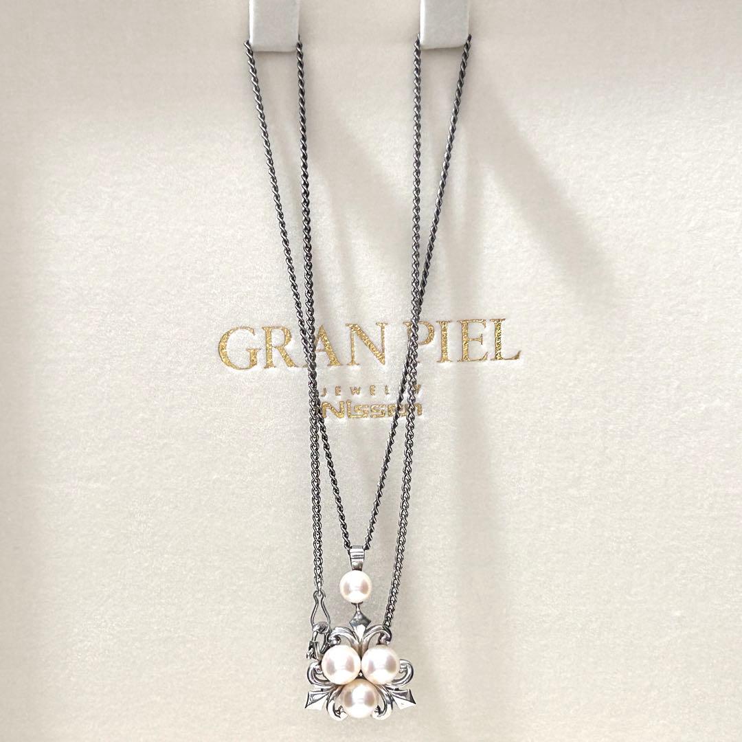 Mikimoto Akoya Pearl Necklace with 6mm pearls, 40cm length, weighing 5g, displayed on white background