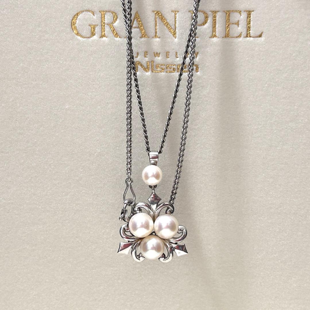 Mikimoto Akoya Pearl Necklace with 6mm pearls, 40cm length, weighing 5g, displayed on white background