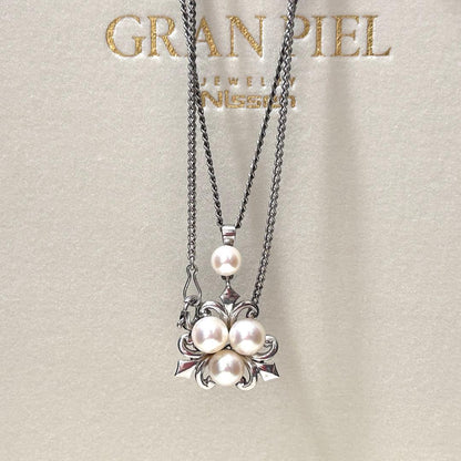 Mikimoto Akoya Pearl Necklace with 6mm pearls, 40cm length, weighing 5g, displayed on white background