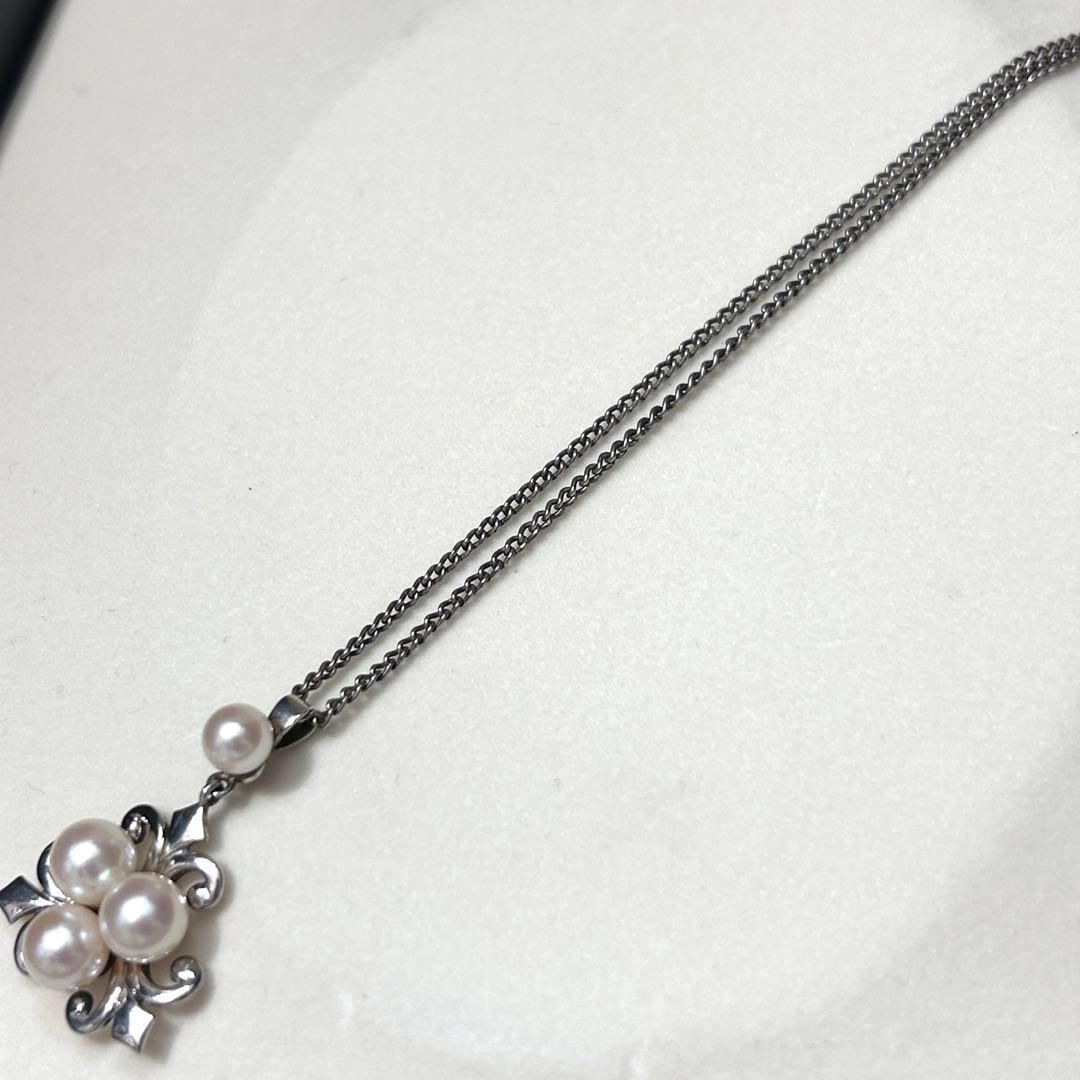 Mikimoto Akoya Pearl Necklace with 6mm pearls, 40cm length, weighing 5g, displayed on white background