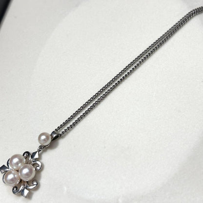 Mikimoto Akoya Pearl Necklace with 6mm pearls, 40cm length, weighing 5g, displayed on white background