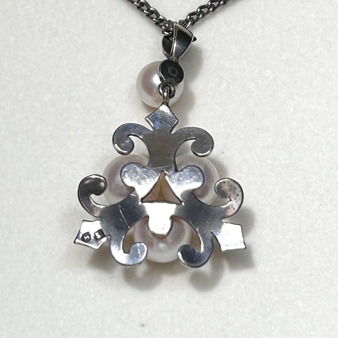 Mikimoto Akoya Pearl Necklace with 6mm pearls, 40cm length, weighing 5g, displayed on white background