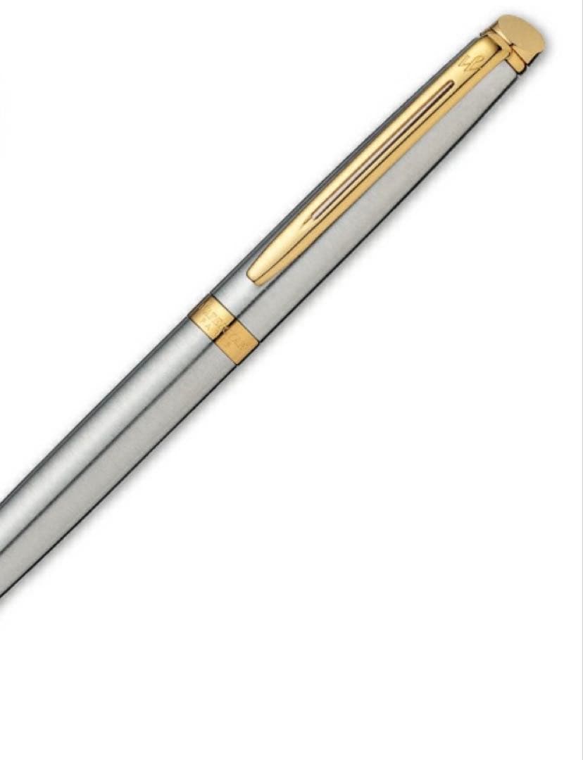 Waterman ballpoint pen with silver body and gold trim on a white background