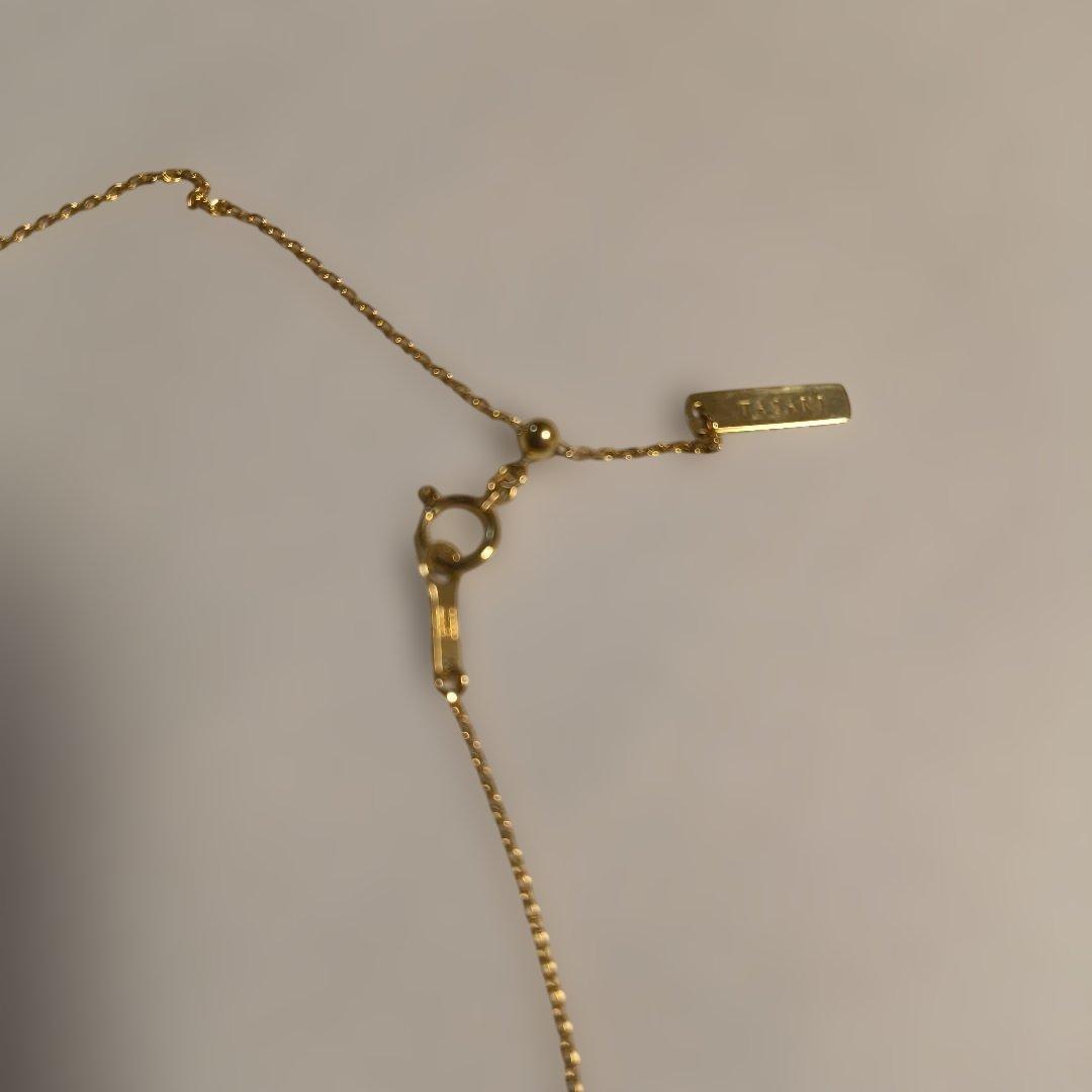 K18 gold necklace with 0.6mm width and 44.5cm length featuring a slide type TASAKI design weighing 2.12 grams