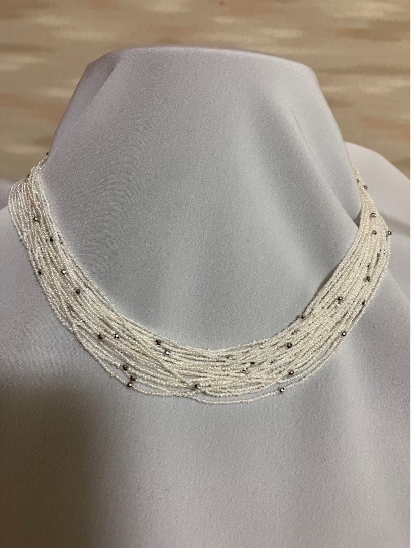 Akoya pearl 10-strand long necklace with small Keshi pearls and k18 white gold mirror-cut balls