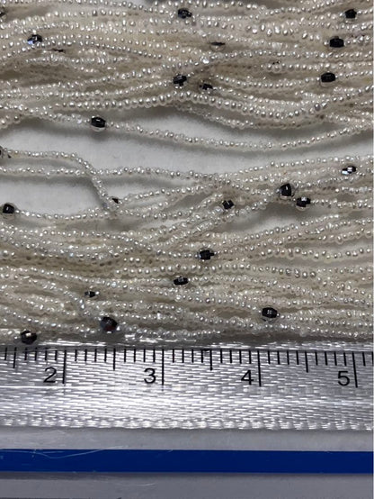 Akoya pearl 10-strand long necklace with small Keshi pearls and k18 white gold mirror-cut balls