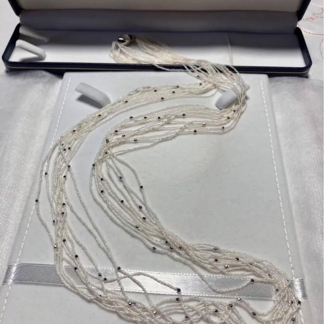 Akoya pearl 10-strand long necklace with small Keshi pearls and k18 white gold mirror-cut balls
