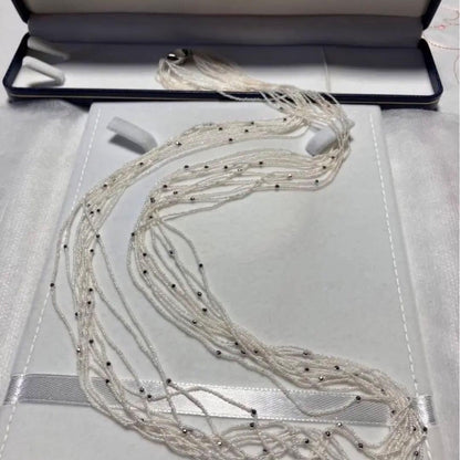 Akoya pearl 10-strand long necklace with small Keshi pearls and k18 white gold mirror-cut balls