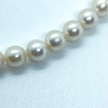 Akoya pearl necklace 7mm to 8mm size, 44 centimeters long, white to creamy pearls with silver beans one-touch clasp