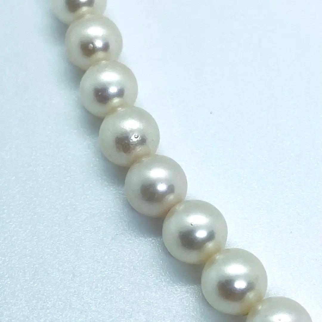 Akoya pearl necklace 7mm to 8mm size, 44 centimeters long, white to creamy pearls with silver beans one-touch clasp